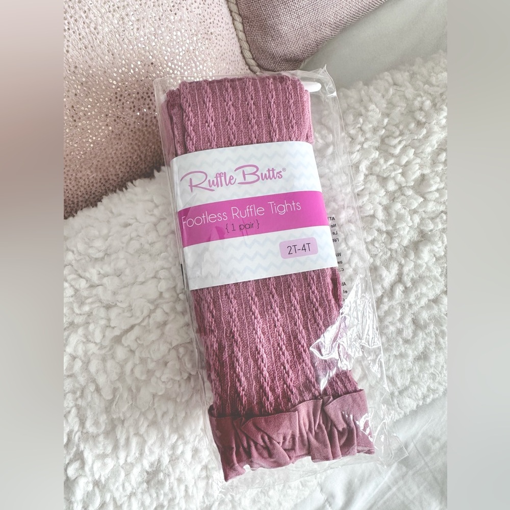New Footless Ruffle Butts tights size 2T-4T. Mauve color.